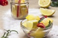 Salted canned lemons and chili peppers in jar Royalty Free Stock Photo